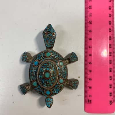 Vintage silver Tibetan-style turtle trinket box featuring an intricate turquoise mosaic inlay
