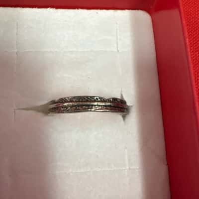  Women's Silver Tone  Ring featuring a Textured Band