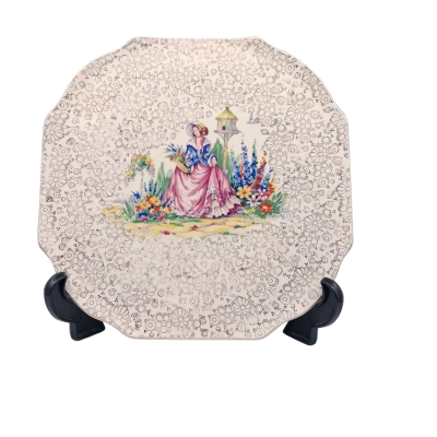 A LOVELY VINTAGE H AND K TUNSTALL CAKE PLATE. CRINOLINE LADY DRESSESD IN A BEAUTIFUL PINK AND BLUE GOWN AND PRETTY  BONNET