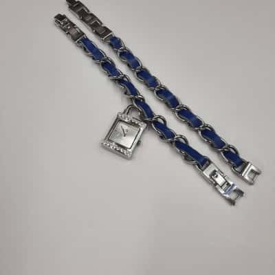 Silver Toned Bracelet Watch with Matching Bracelet Leather Inserts. Working 