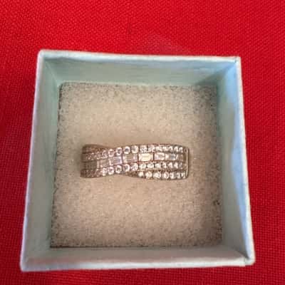 Women's 925 Silver Ring featuring a Crisscross Design Set with Baguette and Round Stones
