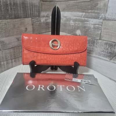 Oroton Womens Deluxe Croc Slim Clutch Coral 