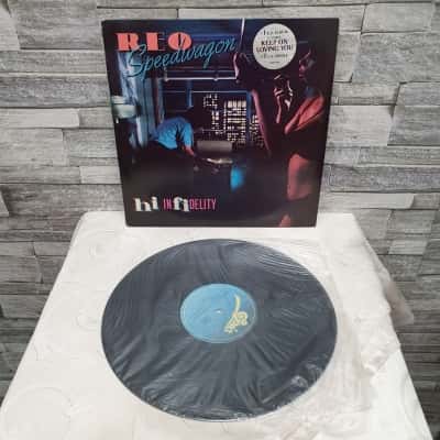 REO speed wagon/ hi infidelity vinyl record 