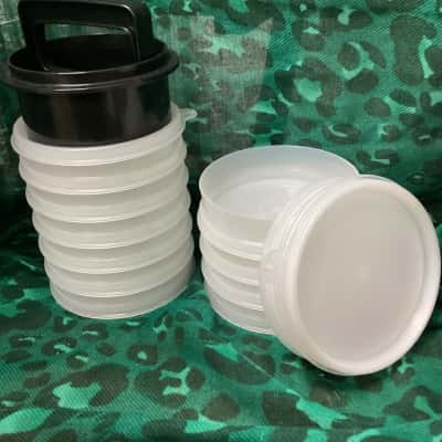 Tupperware Burger Press with 11 containers.