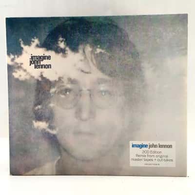 Rare Edition - Imagine By John Lennon 2 CD Edition Remix From Original Master Tapes + Out-Takes. Both Discs & Case Are In Great Condition
