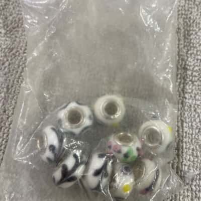  Womens 9 assorted white and silver beads 