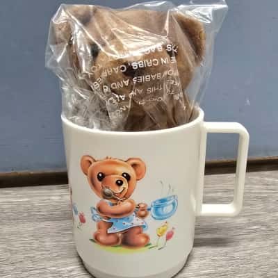 Vintage Avon plush bear in a mug