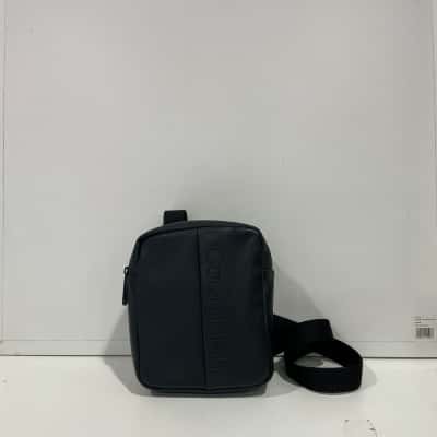 Calvin Klein rubberized convertible reporter bag 