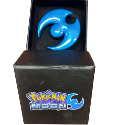 Pokemon Moon pre-order badge in box 