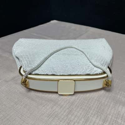 Vintage OROTON Glowmesh evening Bag. Silver snake straps with gold highlights.1970's