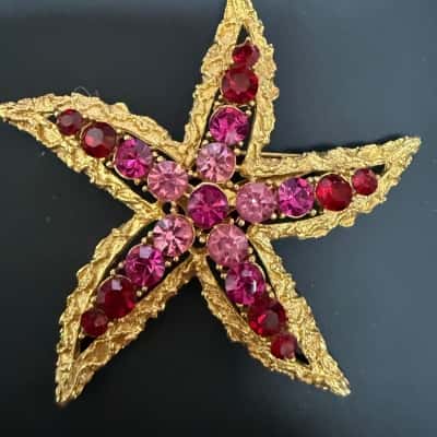  As Donated**Vintage Coro Gold Tone Starfish  Brooch in Vintage Box.  Pink Tone Stones.