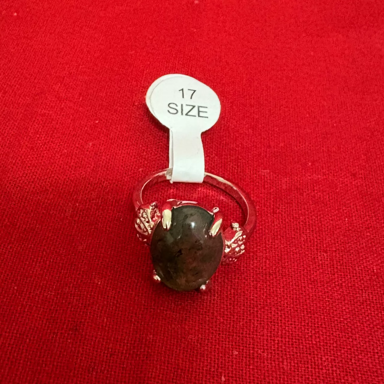 Women's Silver Tone Ring featuring a Polished Oval Shape Greenish Stone