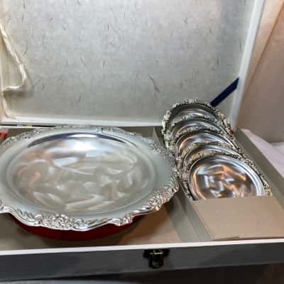 a set of vintage silver serving trays 