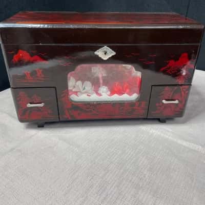 Japanese black and red lacquer musical jewelry box. circa 1950s–1970s