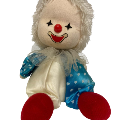 Vintage clown doll - wind up and plays “It’s a Small World” and rotates head
