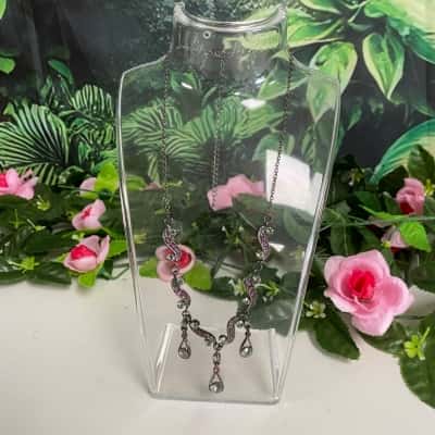 Black metal diamante necklace pink and clear stones