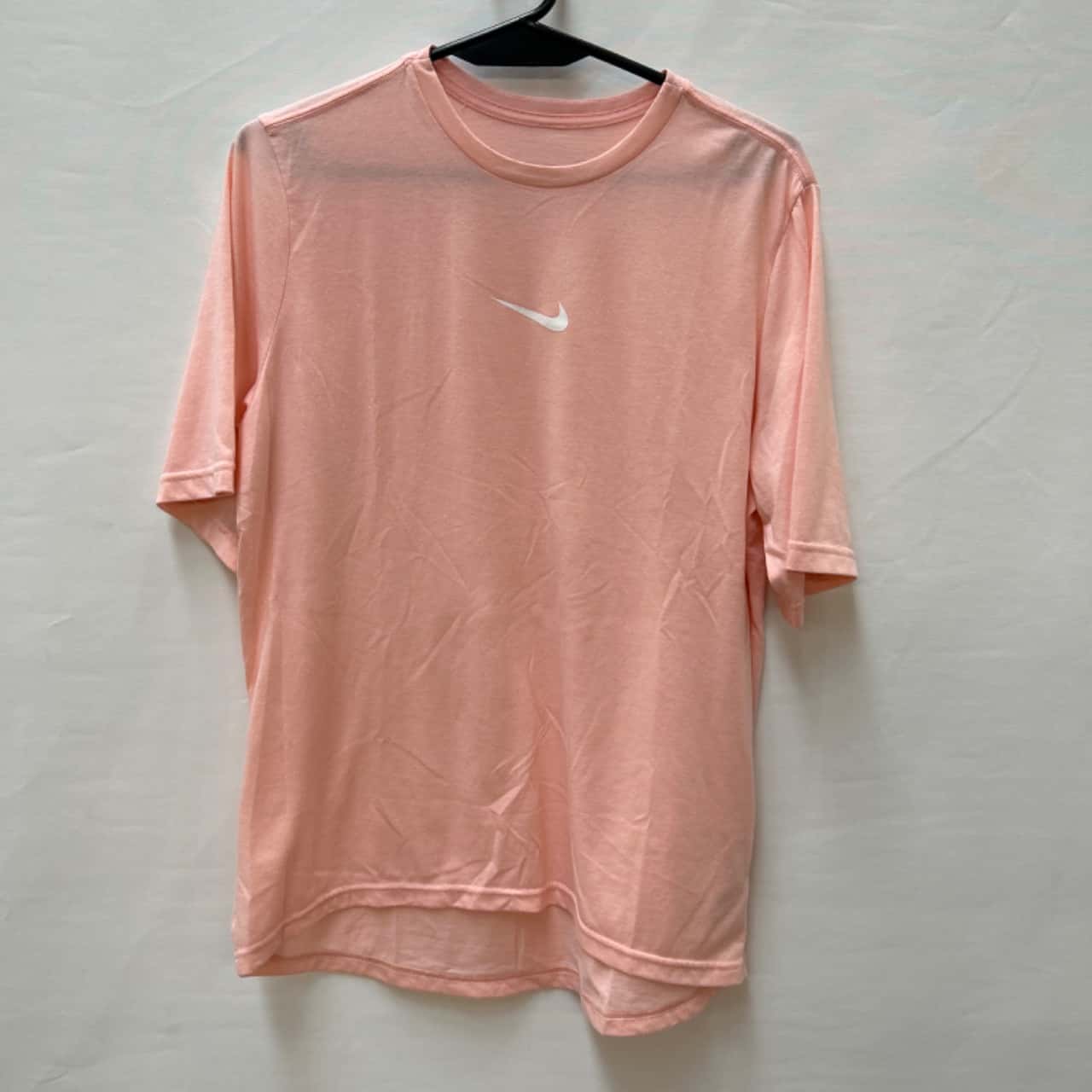 pink and black nike shirts