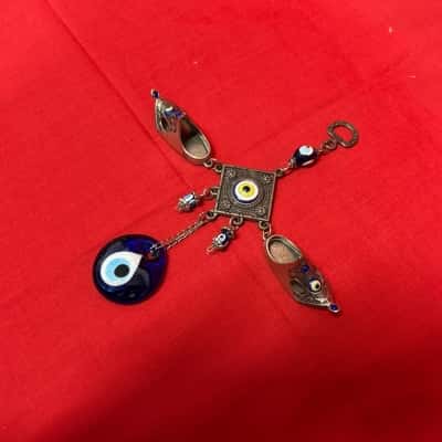 Turkish Nazar Amulet featuring a Blue Glass Eye 