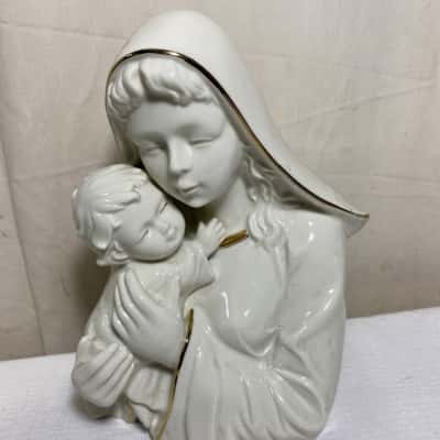 a vintage Mikasa "Holiday Elegance" Madonna and Child fine porcelain figurine featuring delicate 24k gold trim.