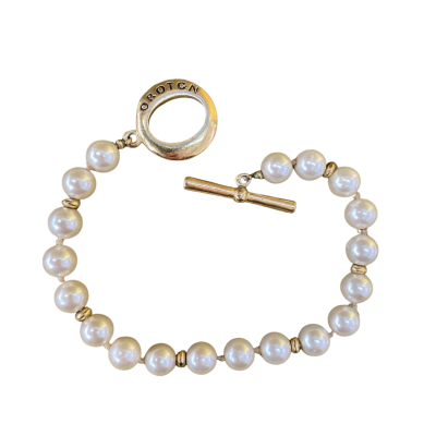 Pearl & Gold Coloured Bracelet with OROTON Stamp.