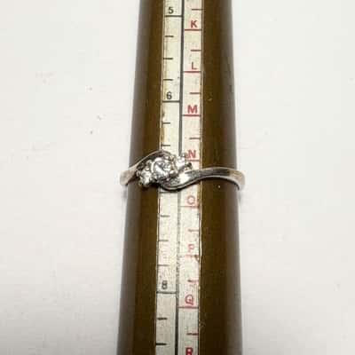 Beautiful 925 Sterling Silver Ring featuring A twist design & crystals