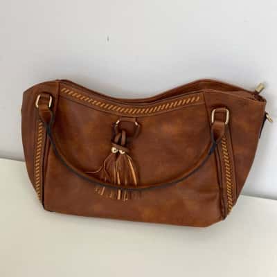 Brown Leather Hobo Shoulder Bag With Tassel And Whipstitch Details 