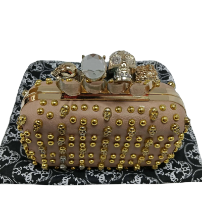 Beige Skull Clutch with Knuckle Duster Clasp #EdgyFashion #StatementBag
