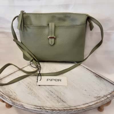Small size soft sage green zippered Piper brand new shoulder bag