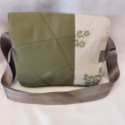 Kathmandu utility multi-coloured and pocket travel style bag