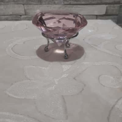 pink crystal paper weight with silver metal stand