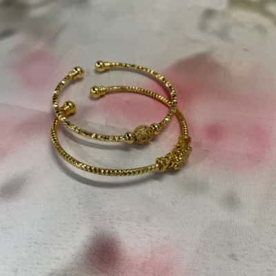 Matching Bright Gold Coloured Bracelets 