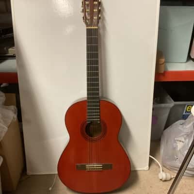 Vintage Yamaha G55 guitar with vinyl case with assorted picks