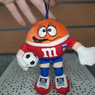 M&Ms orange plush soccer ornament