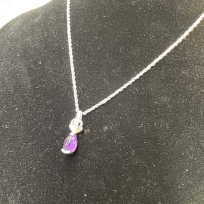 Silver-toned Necklace with Purple Stone Pendant.