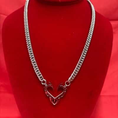 Unisex Silver Tone Stainless Steel Flame Heart Necklace featuring a Curb Chain