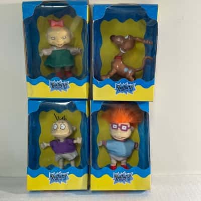 Rugrats Figurines x 4. See photos 