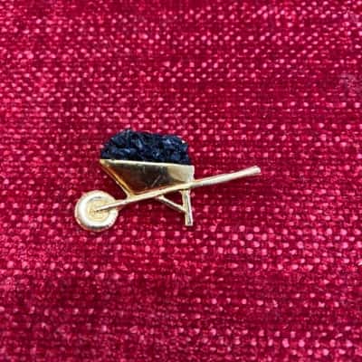 Wheel barrel brooch 