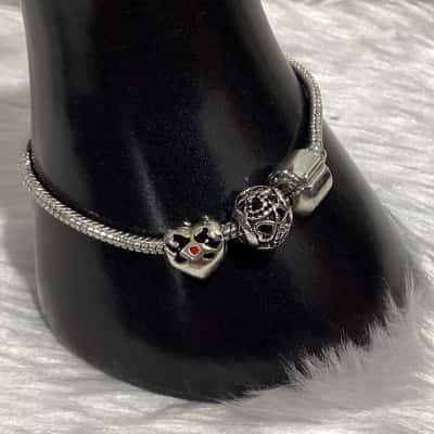 Women’s charm bracelets Silvertone & other 