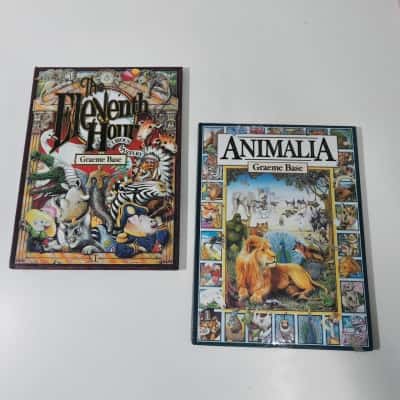 Graeme Base Children's Hardcover Books Animalia and The Eleventh Hour Set of 2
