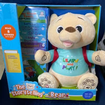 Musical storytelling bear with 8 stories. 30cm. 