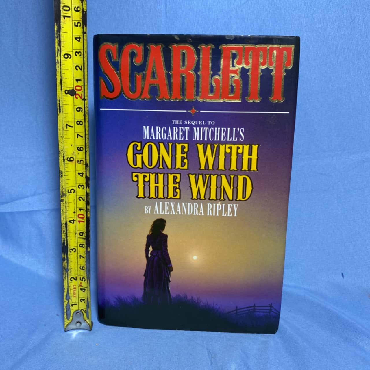 Gone with the wind” by Alexandra Ripley (s)