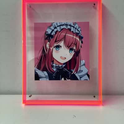 Maid cafe girls anime art in pink acrylic frame. 