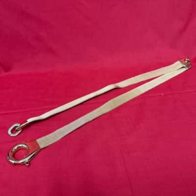 Ladies Gold Tone mesh belt including a distinct hand cuff clasp 