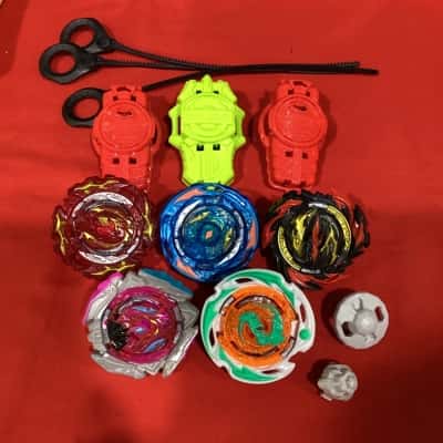 Beyblade Quadstrike Blades and launchers