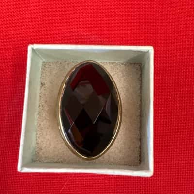  Women's Dress Gold Tone Ring featuring a Large Faceted Black Stone