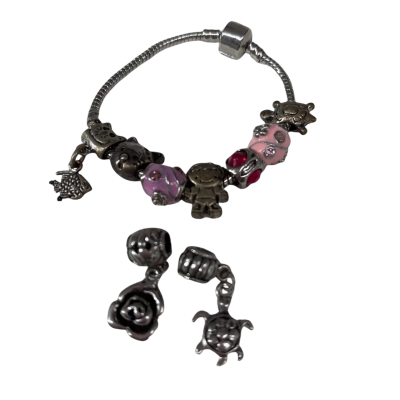  Women’s Charm Bracelet includes 9 charms 