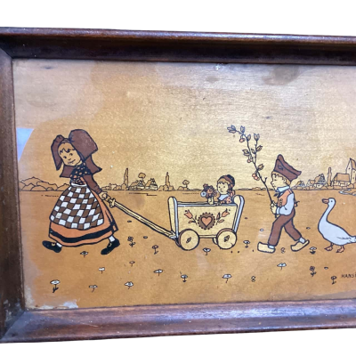 Hansi art under on glass on board as serving tray