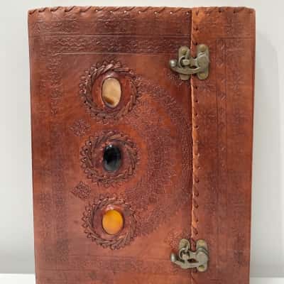 Handmade leather book with paper and crystals