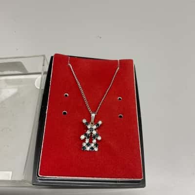  Womens Necklace Silver tones with windmill pendant 