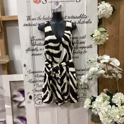 DECJUBA BRAND! Womens  Size 12 Playsuit Animal print / Beige / Brown / Cream! BNWT! STUNNING TIE WAIST SLEEVELESS PLAYSUIT! BEAUTIFUL LIGHTWEIGHT FABRIC! GREAT FOR DRESSING UP OR DOWN!